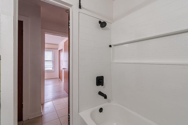 full bathroom featuring tile patterned flooring and shower / bathtub combination