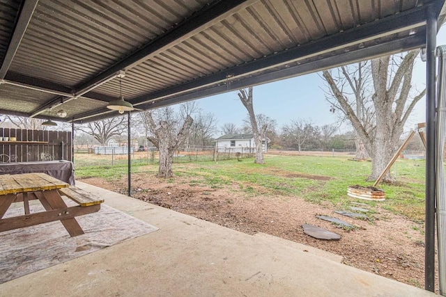 view of yard with fence and a patio