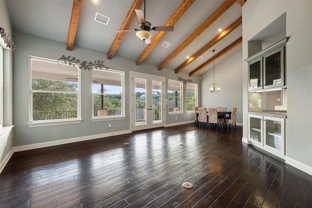 unfurnished sunroom with french doors, visible vents, vaulted ceiling with beams, and ceiling fan with notable chandelier