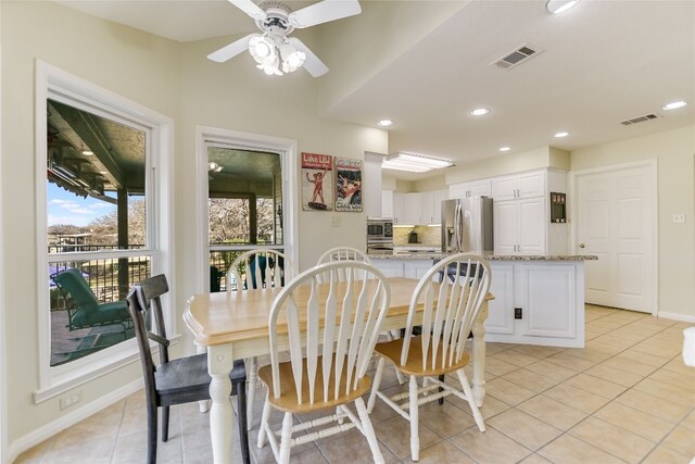 100 Boot Hl, Horseshoe Bay, TX 78657 - dining room with recessed lighting, visible vents, baseboards, and light tile patterned flooring