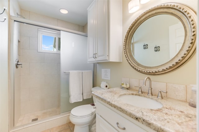 100 Boot Hl, Horseshoe Bay, TX 78657 - bathroom with vanity, tile patterned flooring, a shower stall, and toilet