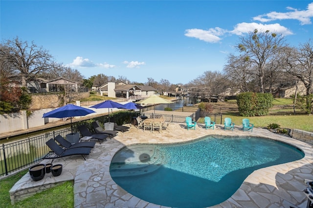 100 Boot Hl, Horseshoe Bay, TX 78657 - view of pool featuring a residential view, fence, a fenced in pool, and a patio