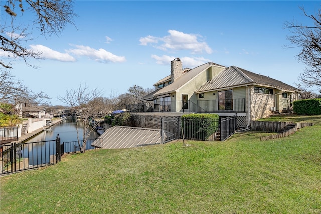 100 Boot Hl, Horseshoe Bay, TX 78657 - view of side of home with a yard, a chimney, a water view, and fence
