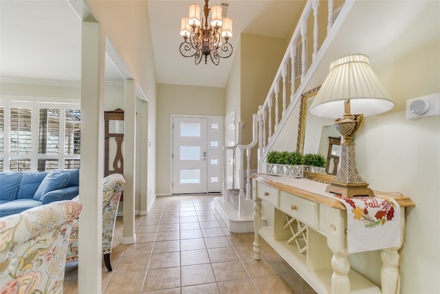 100 Boot Hl, Horseshoe Bay, TX 78657 - foyer entrance featuring an inviting chandelier, baseboards, light tile patterned floors, and stairway