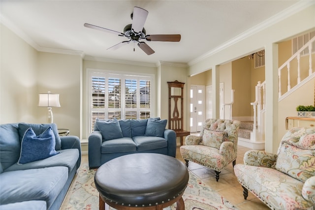100 Boot Hl, Horseshoe Bay, TX 78657 - living area featuring a ceiling fan, light tile patterned flooring, crown molding, and stairs