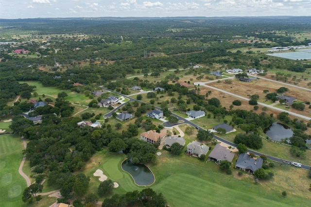 bird's eye view featuring a water view and golf course view