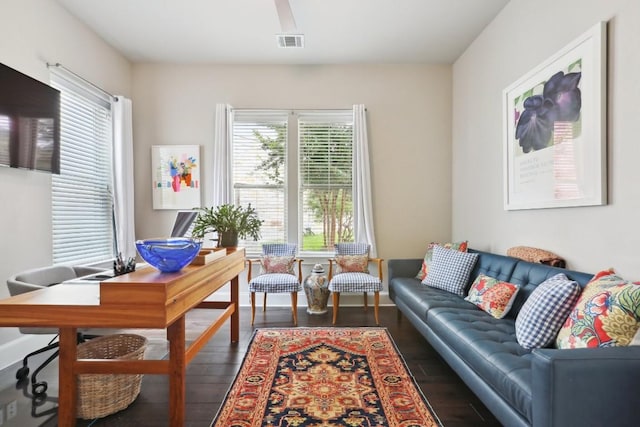 interior space with dark wood-style floors and visible vents
