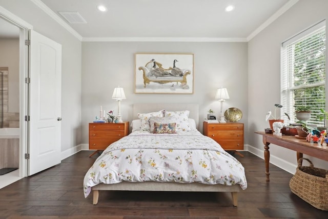 bedroom featuring dark wood-style floors, crown molding, and baseboards