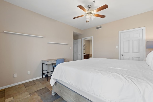 bedroom with a ceiling fan, stone finish floor, visible vents, and baseboards