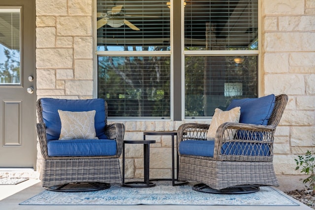 view of patio featuring a ceiling fan