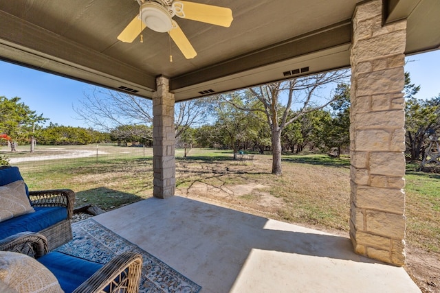 view of patio / terrace with ceiling fan and outdoor lounge area