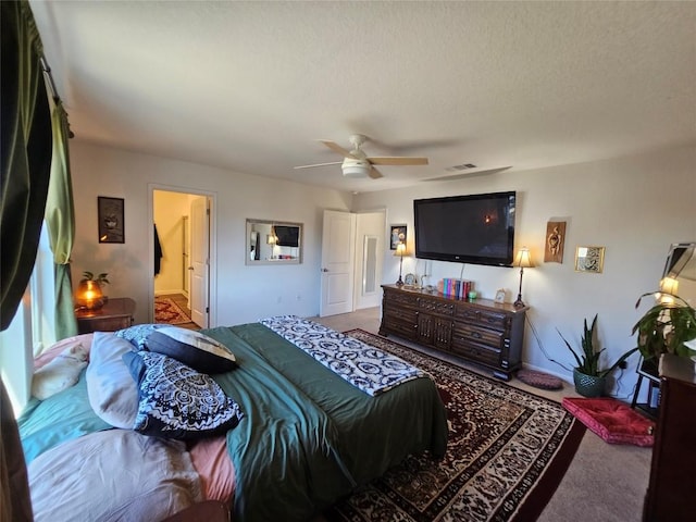 bedroom featuring carpet and a ceiling fan