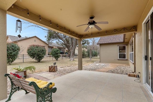 view of patio / terrace featuring a fenced backyard and a ceiling fan