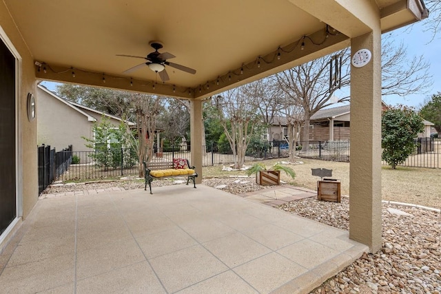 view of patio / terrace with ceiling fan and a fenced backyard