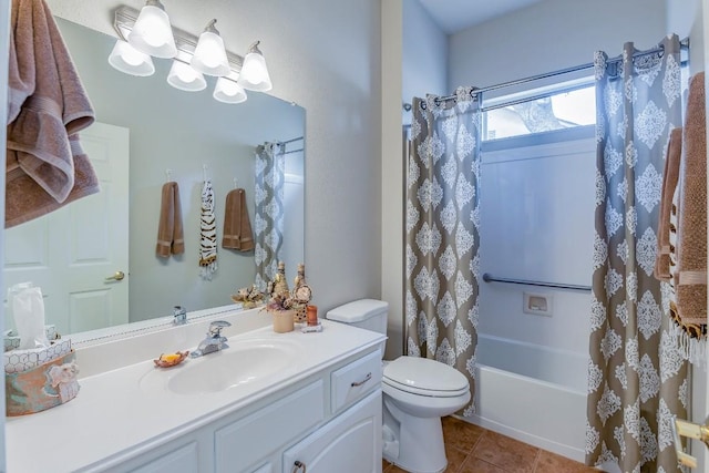 bathroom featuring tile patterned flooring, shower / tub combo with curtain, vanity, and toilet