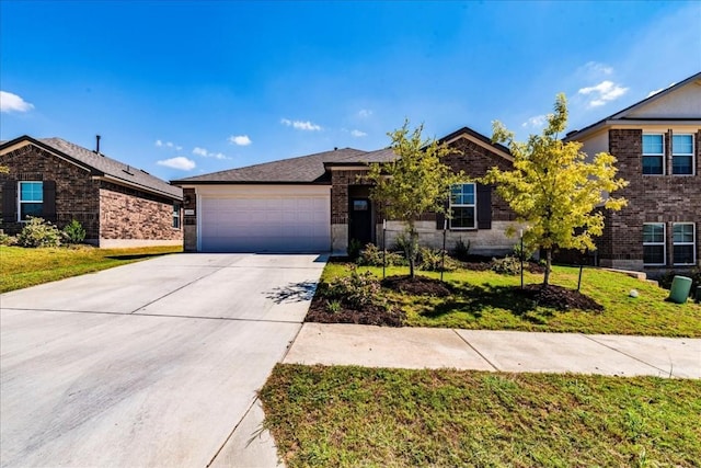 view of front of home with an attached garage, stone siding, concrete driveway, and a front yard