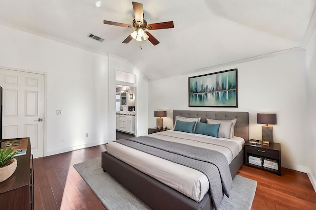 6303 Needham Ln, Austin, TX 78739 - bedroom with lofted ceiling, wood finished floors, baseboards, connected bathroom, and a ceiling fan