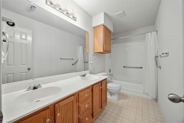 full bath with a textured ceiling, visible vents, and a sink