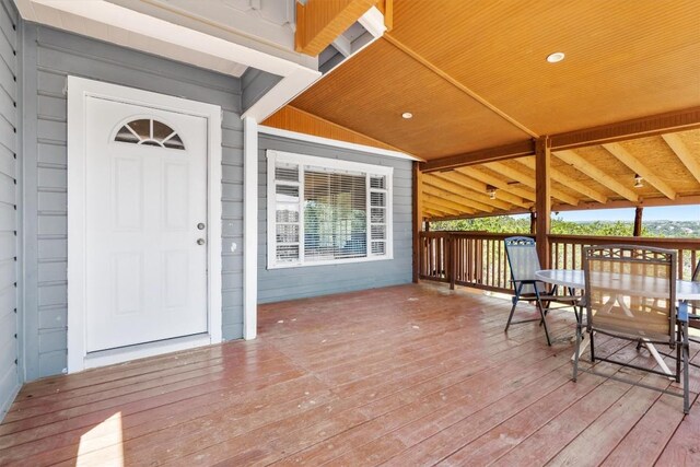 15001 Dexler Dr, Austin, TX 78734 - wooden deck featuring outdoor dining space