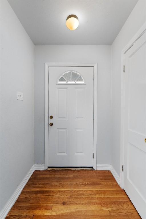 15001 Dexler Dr, Austin, TX 78734 - entryway featuring baseboards and light wood finished floors