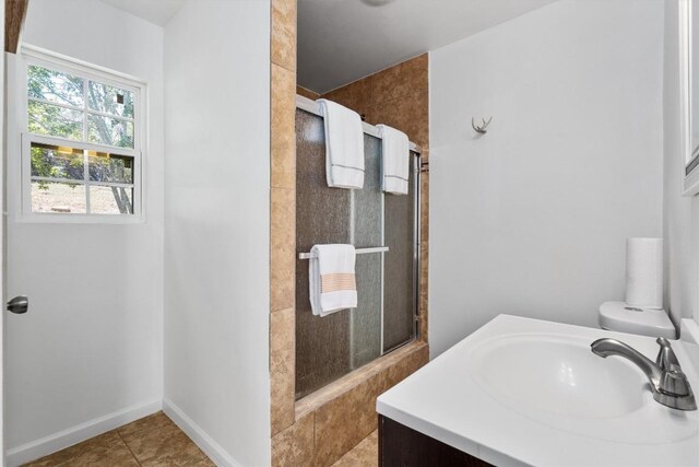 15001 Dexler Dr, Austin, TX 78734 - bathroom featuring a tile shower and vanity