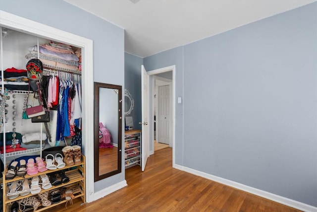 15001 Dexler Dr, Austin, TX 78734 - bedroom with wood finished floors and a closet