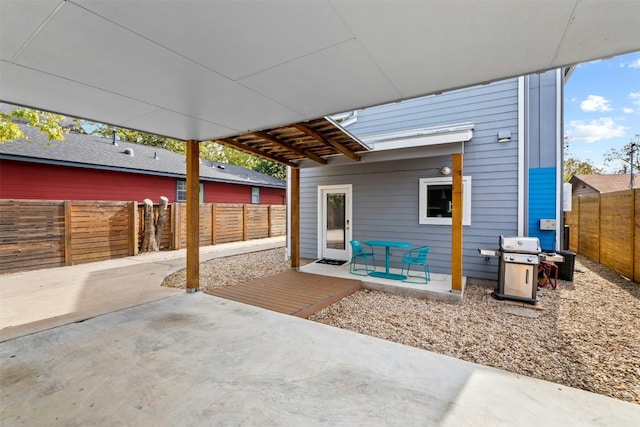 view of patio featuring a fenced backyard and grilling area