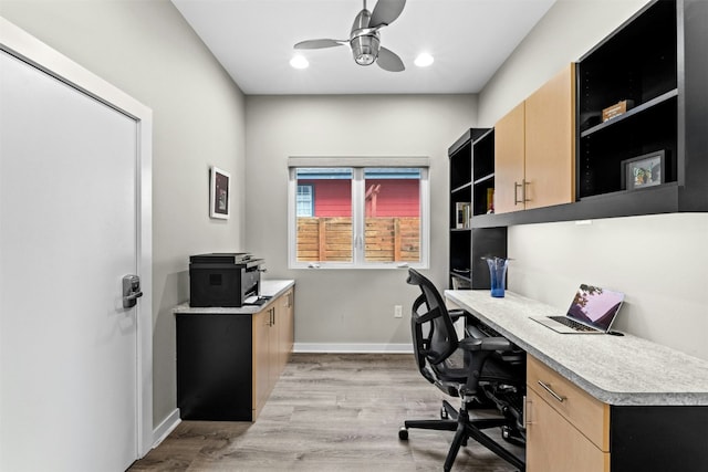 office space with light wood-style floors, recessed lighting, ceiling fan, and baseboards