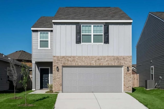 view of front of house featuring cooling unit, a garage, brick siding, concrete driveway, and board and batten siding