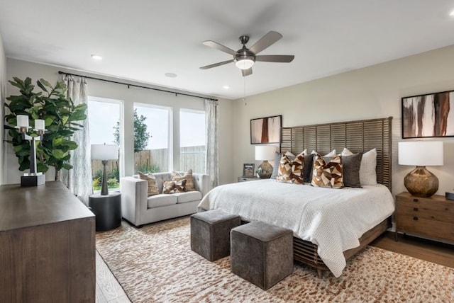 bedroom with light wood-style flooring, ceiling fan, and recessed lighting