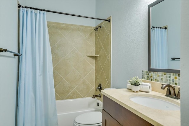 bathroom with a textured wall, vanity, toilet, and shower / tub combo with curtain