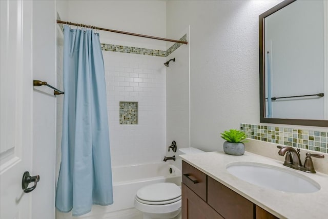 bathroom with toilet, shower / bath combo with shower curtain, backsplash, and vanity