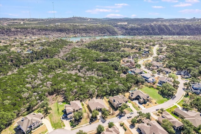 bird's eye view featuring a residential view and a water view