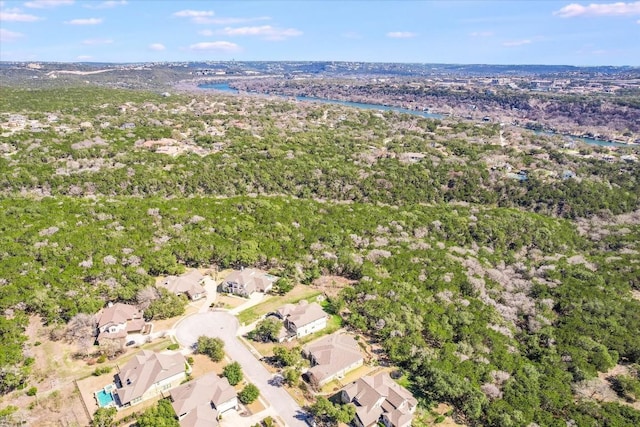 drone / aerial view featuring a residential view and a water view