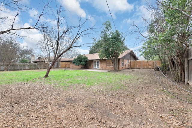 view of yard featuring a fenced backyard