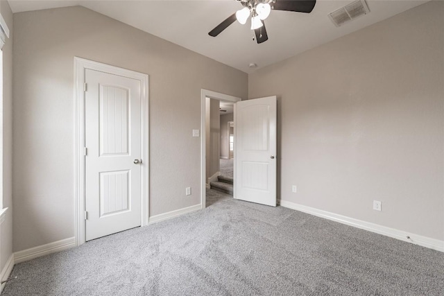 201 Seminole Canyon Dr, Georgetown, TX 78628 - unfurnished bedroom with carpet, a ceiling fan, and lofted ceiling
