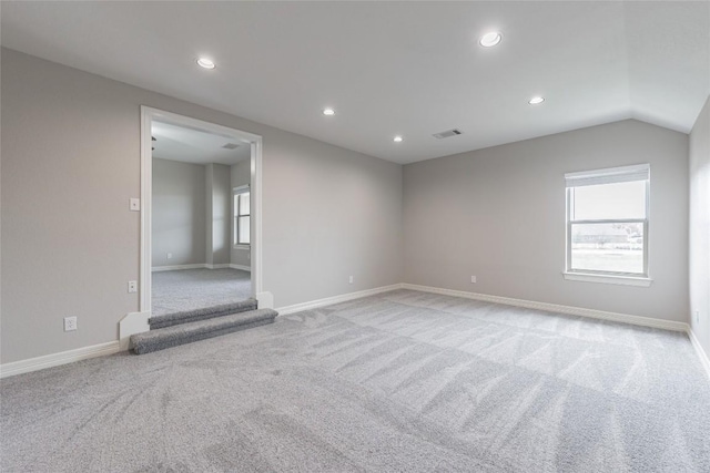201 Seminole Canyon Dr, Georgetown, TX 78628 - spare room with light colored carpet, recessed lighting, plenty of natural light, and vaulted ceiling