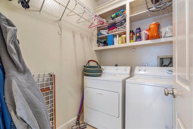 laundry area with laundry area and separate washer and dryer