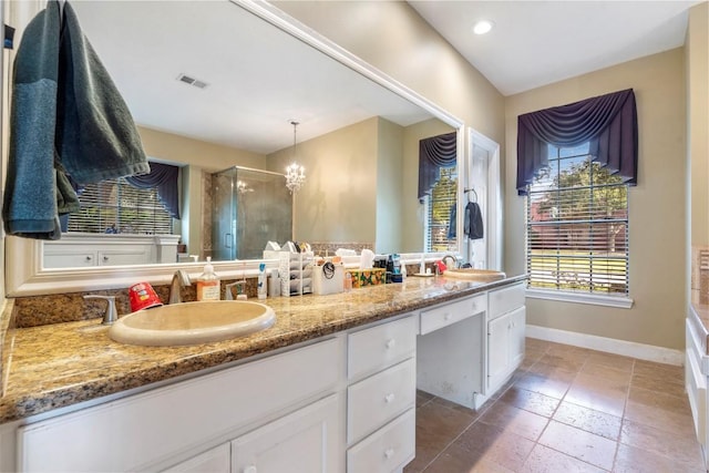 full bathroom featuring a sink, visible vents, baseboards, double vanity, and a stall shower