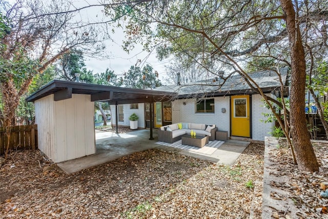 400 Cherry Hill Dr, Austin, TX 78704 - back of house with an outdoor living space, a patio area, brick siding, and fence