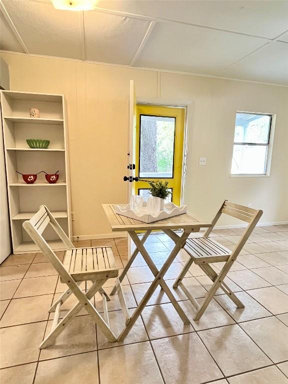 400 Cherry Hill Dr, Austin, TX 78704 - dining room with healthy amount of natural light and light tile patterned flooring