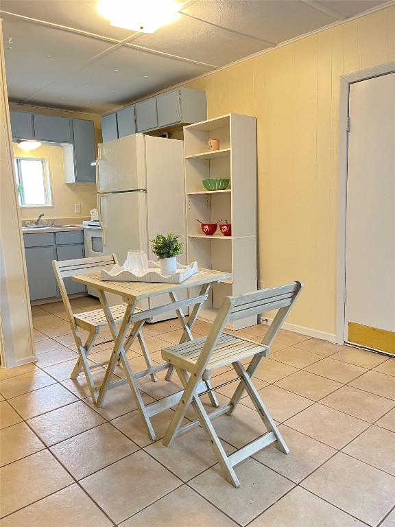 400 Cherry Hill Dr, Austin, TX 78704 - dining area featuring light tile patterned floors