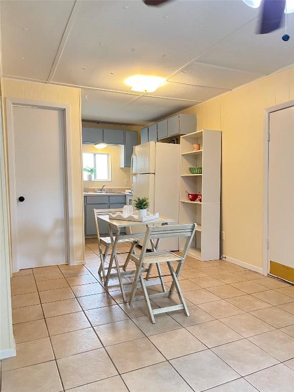 400 Cherry Hill Dr, Austin, TX 78704 - dining area featuring light tile patterned floors