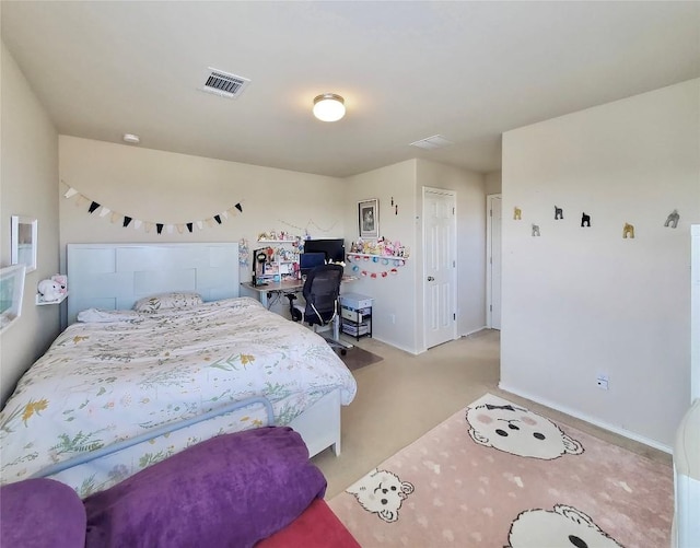 bedroom featuring light colored carpet, visible vents, and baseboards