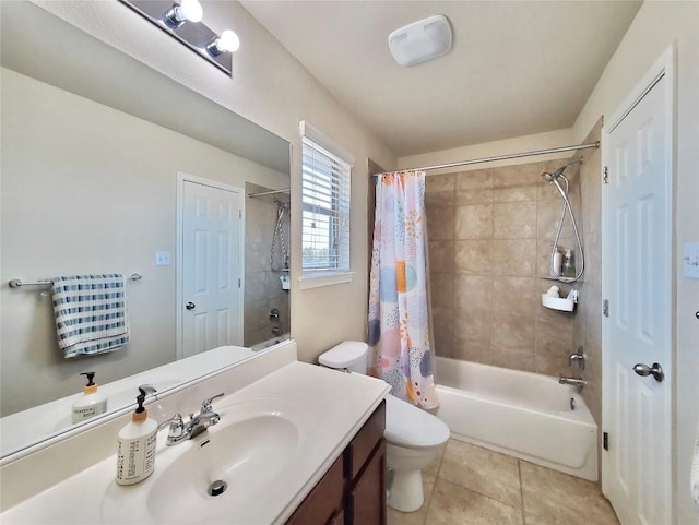 full bath with shower / bath combo with shower curtain, vanity, toilet, and tile patterned floors