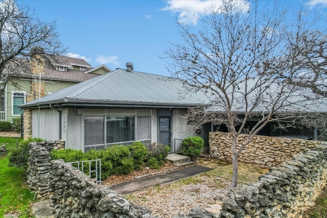 view of front facade with metal roof