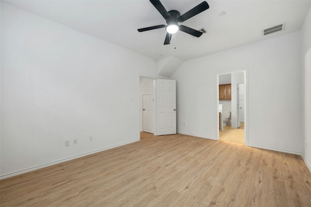 unfurnished bedroom with ensuite bathroom, light wood-style flooring, visible vents, and baseboards