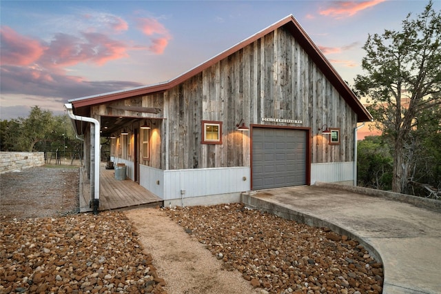 1386 Patterson Rd, Austin, TX 78733 - view of front of home with driveway and a garage