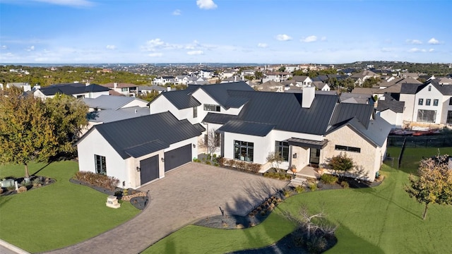 drone / aerial view with a residential view