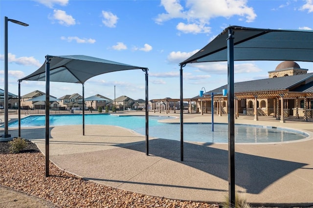 community pool with a patio